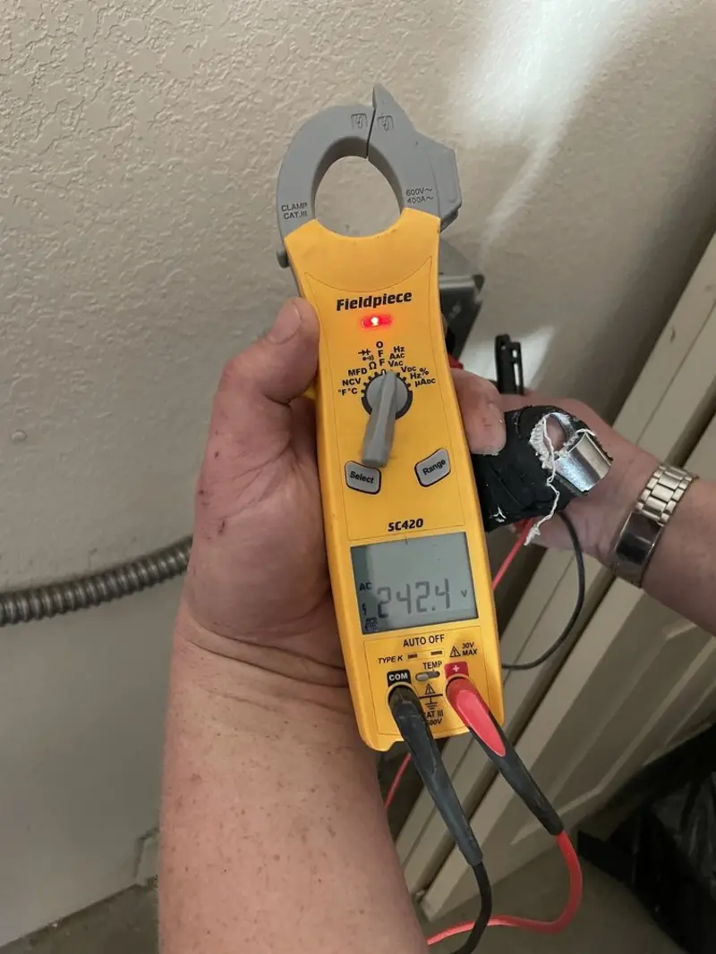 Voltage testing with clamp meter during Aluminum Wiring Replacement in Odessa